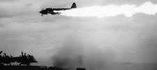 Burning P1Y1 Ginga bomber over CVE-79