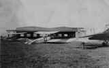 aircraft in front of hangar